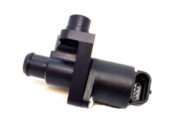 Idle motor with housing